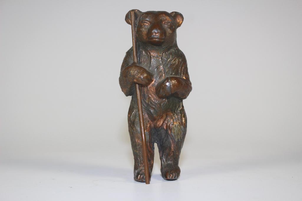 Bronze Bear Cub Holding Walking Stick (1 of 9)
