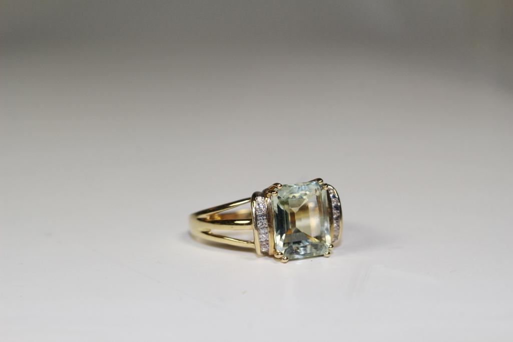 14kt Yellow Gold Ladies Ring With Emerald Cut Topaz (1 of 6)
