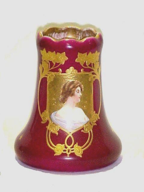 Royal Bonn Portrait Vase: with portrait of a lady, surrounded by gold gilt decoration. Condition two small hairlines at top on inside. h.5 3/''4 x 4 3/4 ''