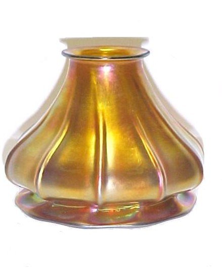 Iridescent Gold Aurene 10 Ribbed Shade: flare form with pronounced rim. Attributed to Steuben. The gold on the rim and inside is very Bright and hard to picture. Condition excellent. h. 4'' dia. 5'' rim 2'' opening.