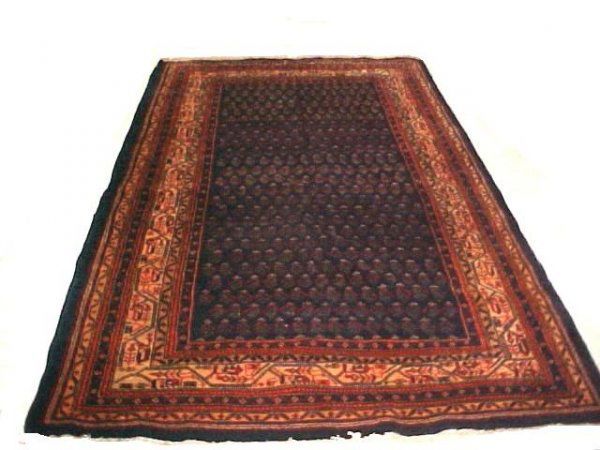 Turkish Persian Wool Rug: or possibly Baluch area rug. Dark blue field. Condition good from private home.All rugs sell no reserves. size 5' 6'' x 9' 3''