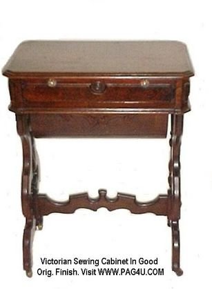 Victorian Sewing Cabinet With Barrel Row Storage B: In good old original finish. Condition replaced drawer knobs otherwise appropriate wear for age. h.30'' w.24'' d.17''