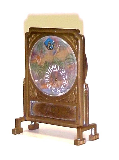 Late 19th. Century Rare And Unusual Swiss Table Cl: signed L' Arched Noe -- fab,suisse featuring face of jungle scene, a procession of wild animals appear in a window as clock tick's away. Mounted in a miniature bronzes Chinese screen, with panel of sa