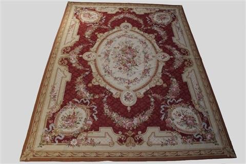 An Aubusson Style Needlepoint Wool Rug,: condition overall good. 9'' x 12''