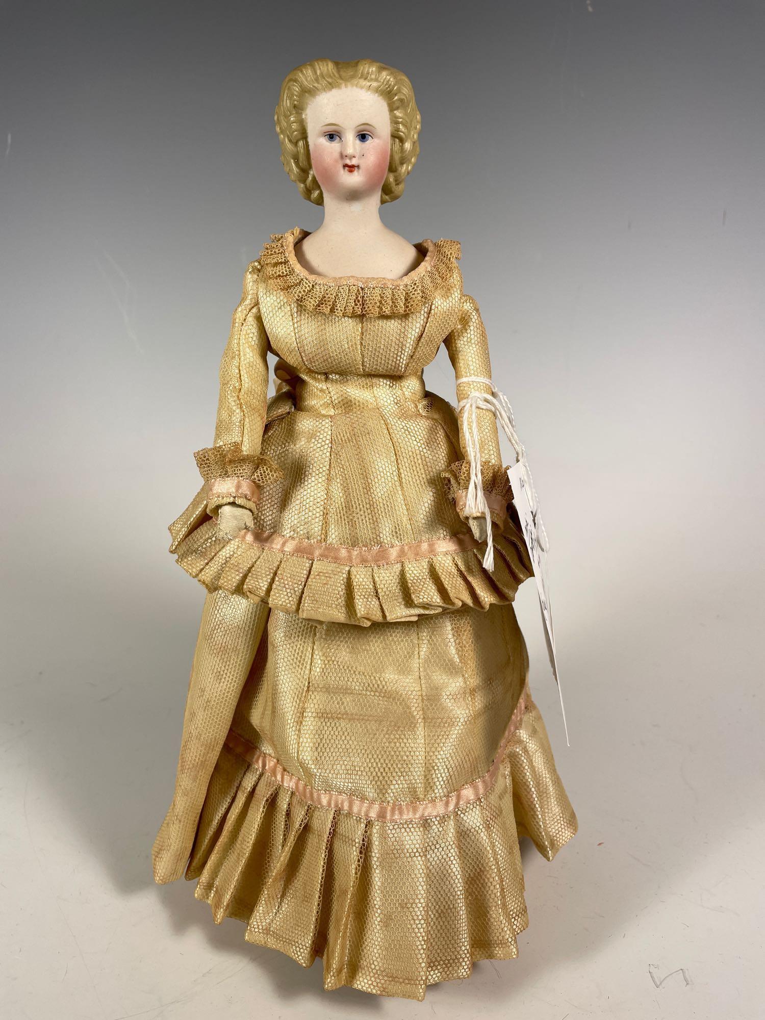 12" Conta Boehme Blonde Parian Fancy Coronet Braided: 12" Conta Boehme Blonde Parian Fancy Coronet Braided Bun Doll on cloth and kid body Circa 1860's. Painted eyes with hair style having light brushstrokes on forehead with coronet circling head and brai