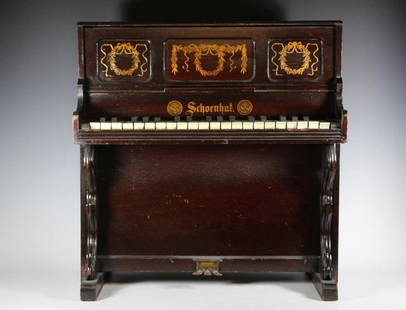 19th Century Child's Toy Model SCHOENHUT Upright Piano: Early Schoenhut childrens size toy piano with 22 keys and original finish. Measuring 24" tall x 23" wide x 12" deep. Shoenhut: Toy pianos originated in Germany during the mid-19th century as toys and