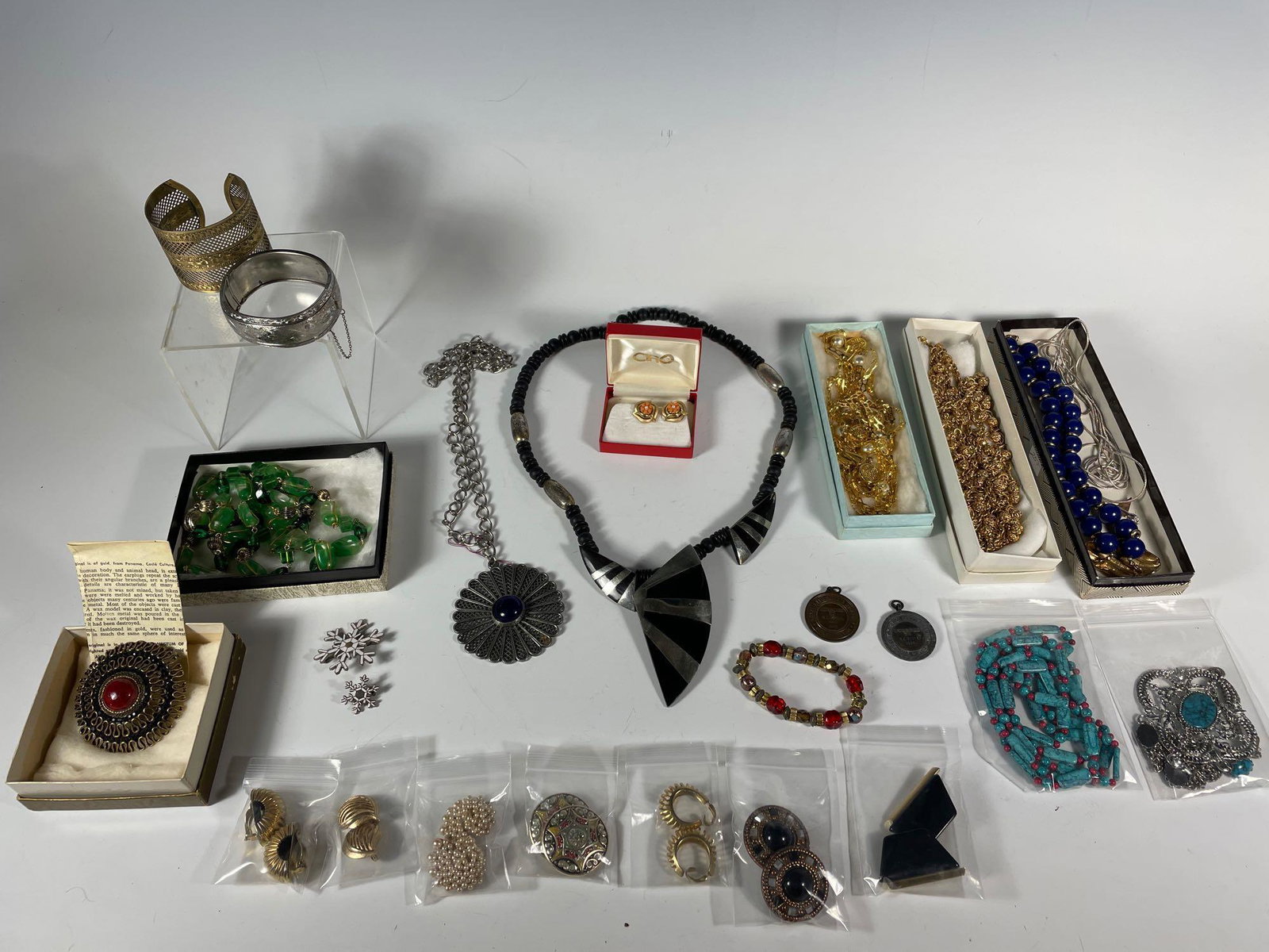 Group Lot of Vintage Costume Jewelry: Necklaces, earrings, bracelets and cuffs. Various styles and bead work. See photos
