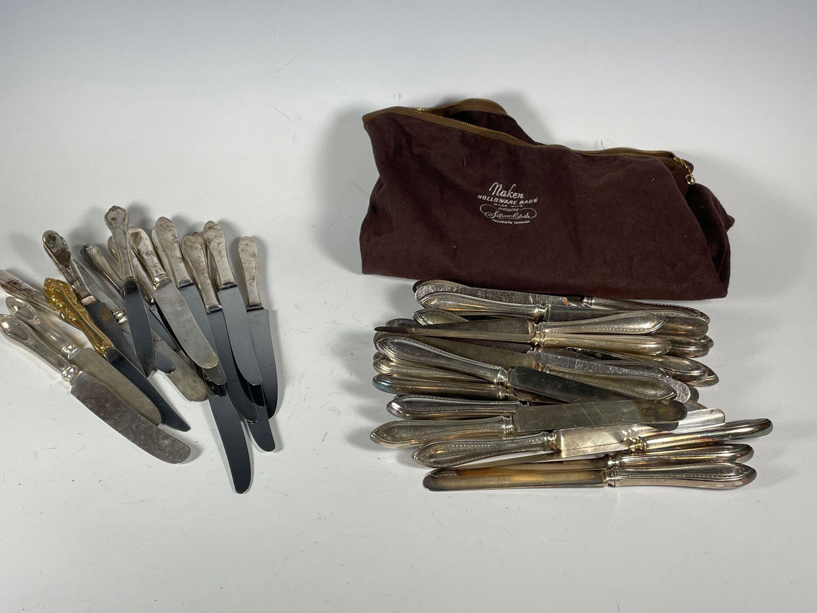 Silver Plate Butter Knife Group: Includes; Holmes & Edwards and dozens of Community knives.