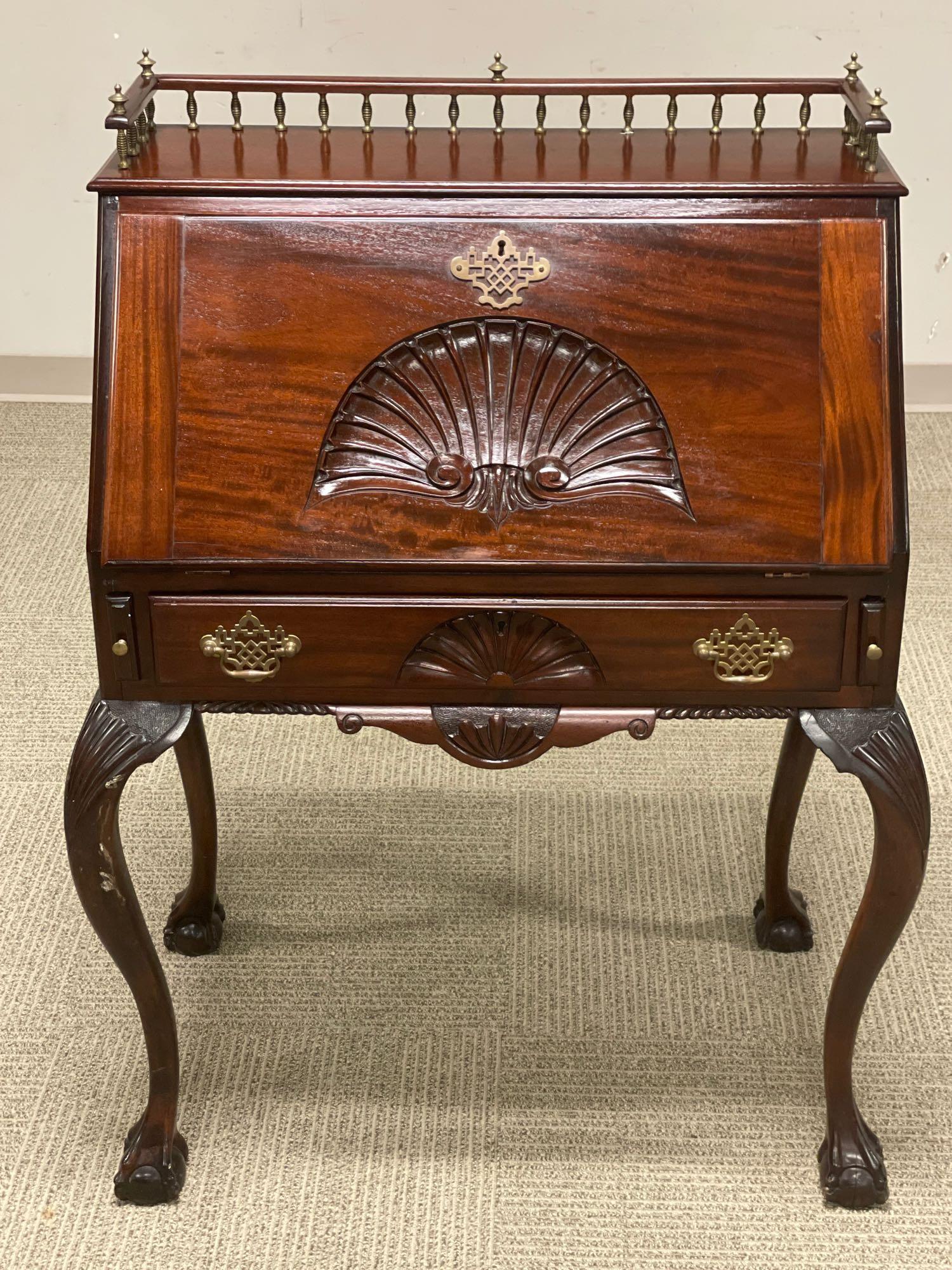 Fine Quality 19th Century Carved Ladies Slant Front: Shell carved front on ball and claw feet and brass gallery. Measuring Approx. 42" tall by 29" wide by 18" deep. See photos.