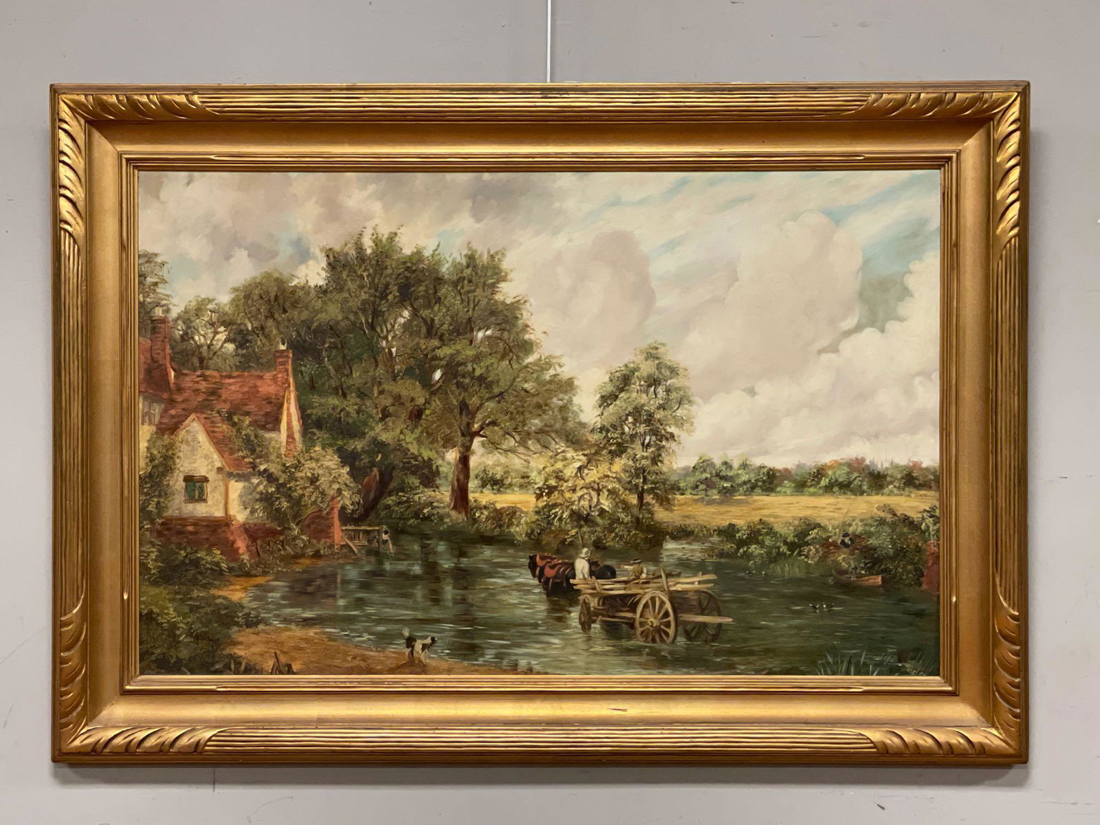 "The Haywain" Hand Colored in Oil After John Constable: An absolutely incredible rendering of the iconic "THE HAYWAIN" oil on board and contained in late 19th century gold gilt frame. Original work of John Constable. Measuring approx 29" tall x 44" wide (i