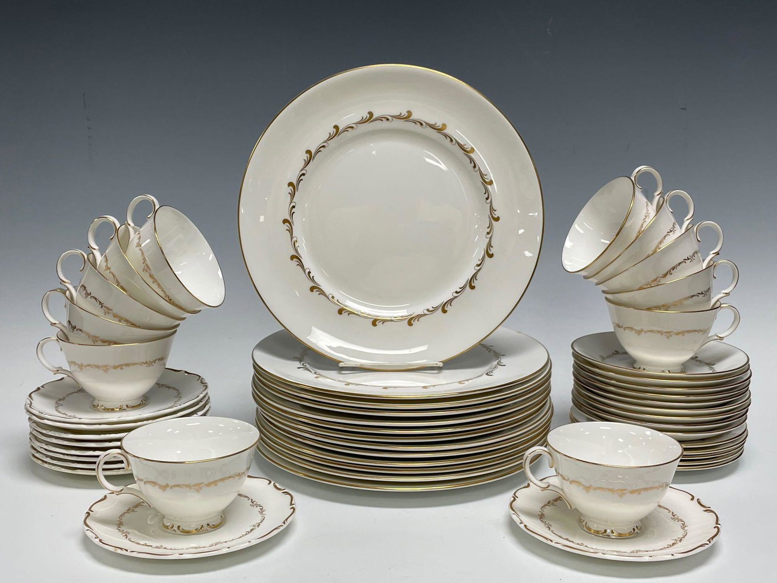 Royal Doulton "Richelieu" and "Rondo" Dinnerware: Royal Doulton "Richelieu" and "Rondo" Dinnerware. Rondo includes 10 saucers and Richelieu includes; 14 dinner plates, 14 saucers and 12 cups. In good condition, see photos.
