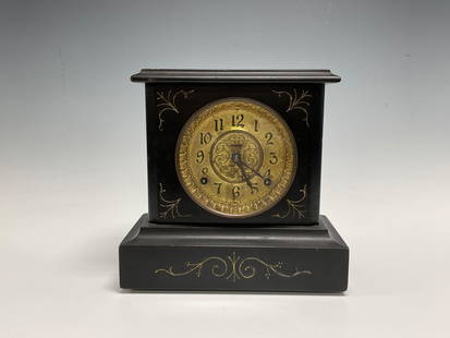 Ingraham WIZARD Eight Day Ebonized Cathedral Gong Clock: Wizard model Eight day, half hour strike, cathedral gong and patent regulator mantle or shelf clock by THE E. INGRAHAM COMPANY of Bristol, Conn. Ebonized wood case and brass metal embossed 5.25" dial.