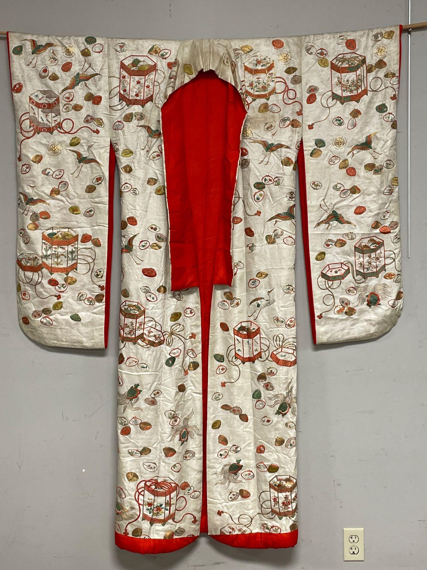20th Century Gold Threaded Dress Uchikake Kimono Gown: Cream silk main colored with gold threading throughout and red colored interior. Good overall condition as shown. Ceremonial dress Kimono having various cranes and turtles symbolic meaning : the crane