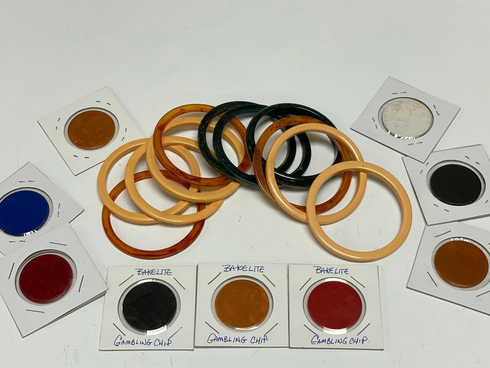 Bakelite Gambling Chips and Bracelets: Bakelite Gambling Chips and Bracelets. See photos.