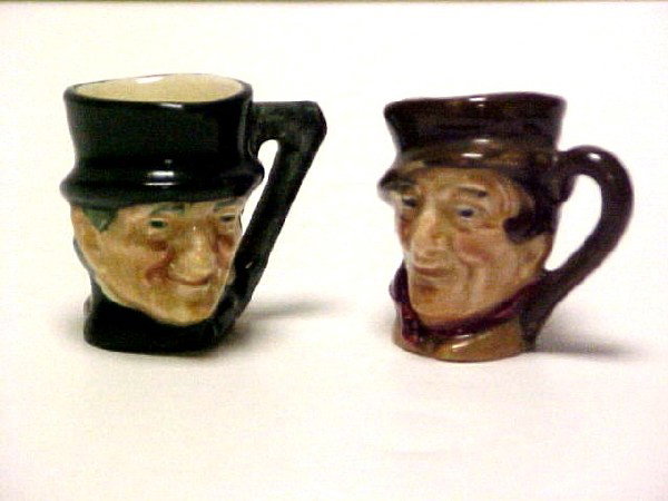 Two Miniature Royal Doulton Toby Jugs,: both 1 1/2'' and in good condition.