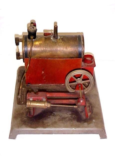 Vintage Electric Weeden Steam Engine: Cast iron and brass. Decal mostly gone should read ''Trade Weeden Mark Weeden Mfg. Co. Reg. U.S. Pat. Office New Bedford Mass. appropriate wear for age. 6'' x 8'' x 9''.