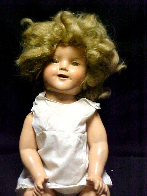 1934 SHIRLEY TEMPLE IDEALCOP N & T CO,: one of the first genuine Shirley Temple dolls by ideal during first year of production, Neck marked SHIRLEY TEMPLE IDEALCOP N & T CO, original sable upper lashes, painted eyebrows & lashes, red dots i