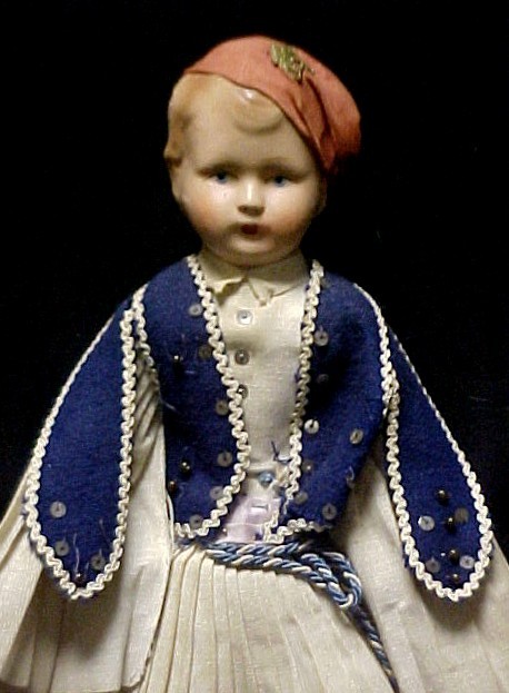 European Dressed Clothed Cloth Doll 18'' Tall,: with plastic head stuffed cloth body with cap and long braided hair, pleated skirt and button vest. Appears to be a dancer. Hole in hat otherwise good condition.