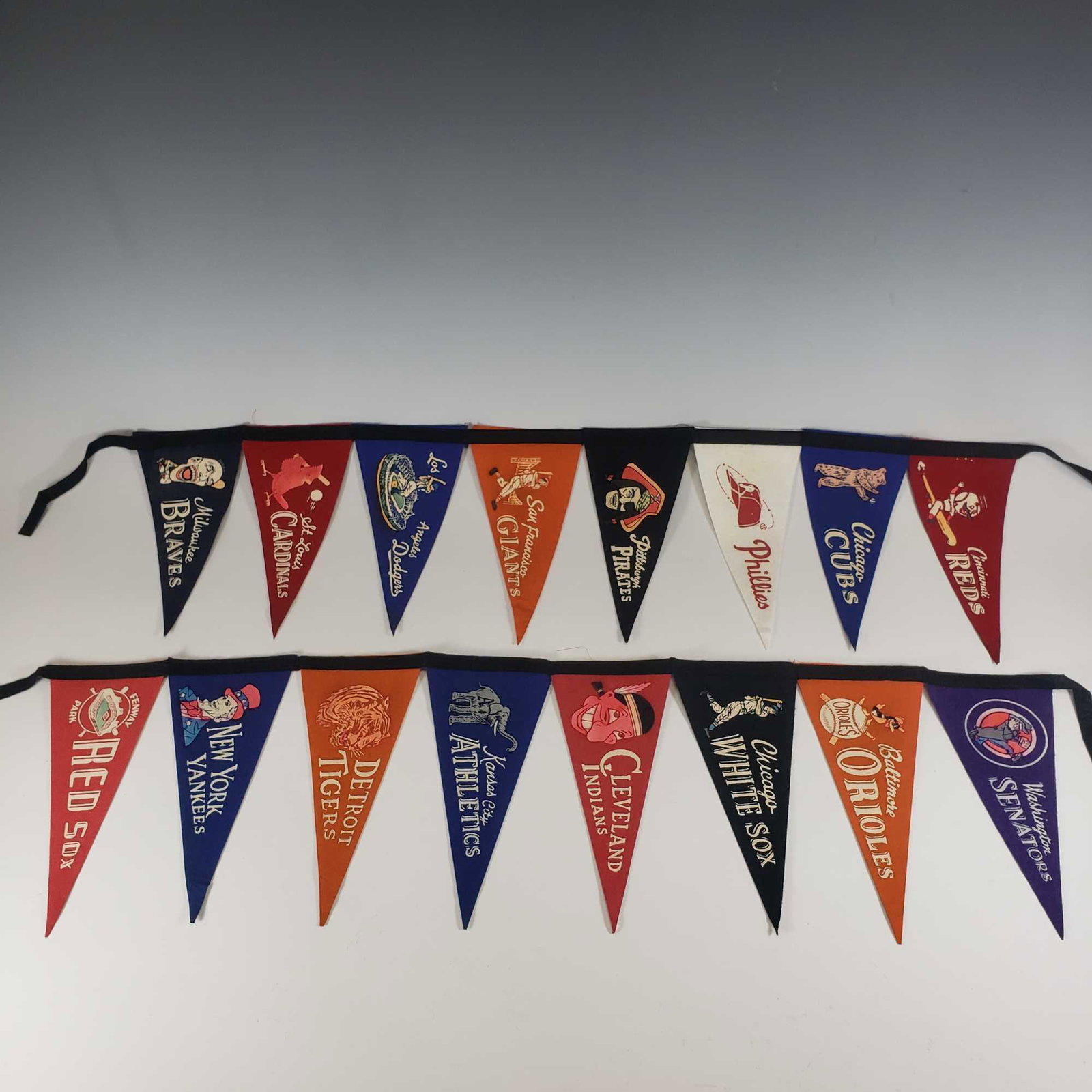 1950's American and National League Miniature Pennant: Late 1950's era pennants featuring (8) mini pennants that are made attached for each league. Trench MFG. Surprisingly extremely nice condition.