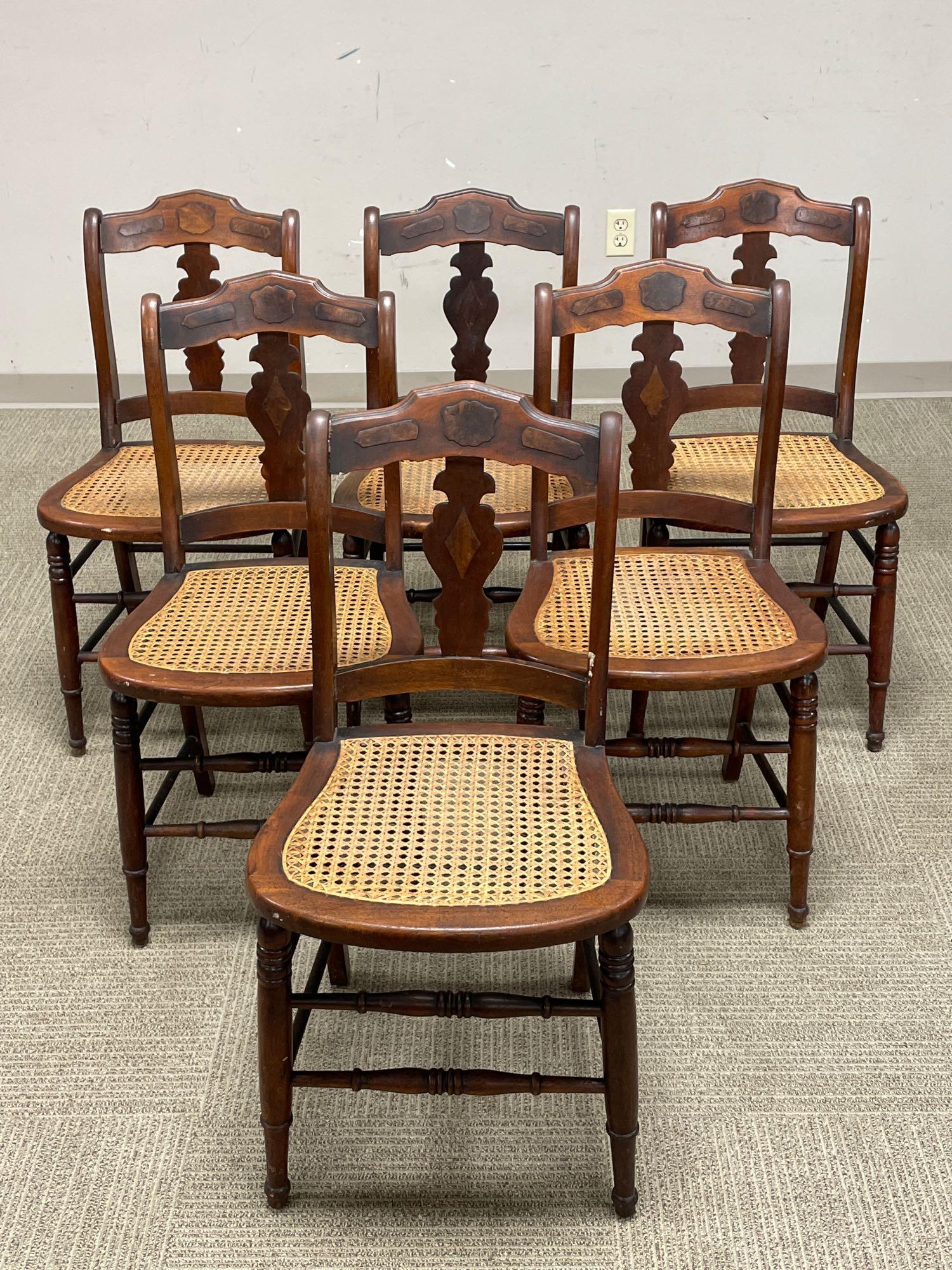 Six (6) American Victorian Caned Seat Dining Chairs: Measuring approx 33" tall (18" tall seat height) x 17" wide x 17" deep. Normal use and wear a shown, see photos. Directly acquired from the Bob and Anne Feller residence of Gates Mills Ohio.