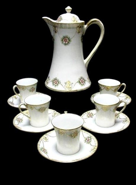 Nippon Hand Painted Six Piece Chocolate Set, : having borders of floral decoration and gold gilt trim. Coco pot 5 cups & saucers. Condition one cup has small flake by handle, normal wear to gilted area's appropriate for age use, otherwise good Coc