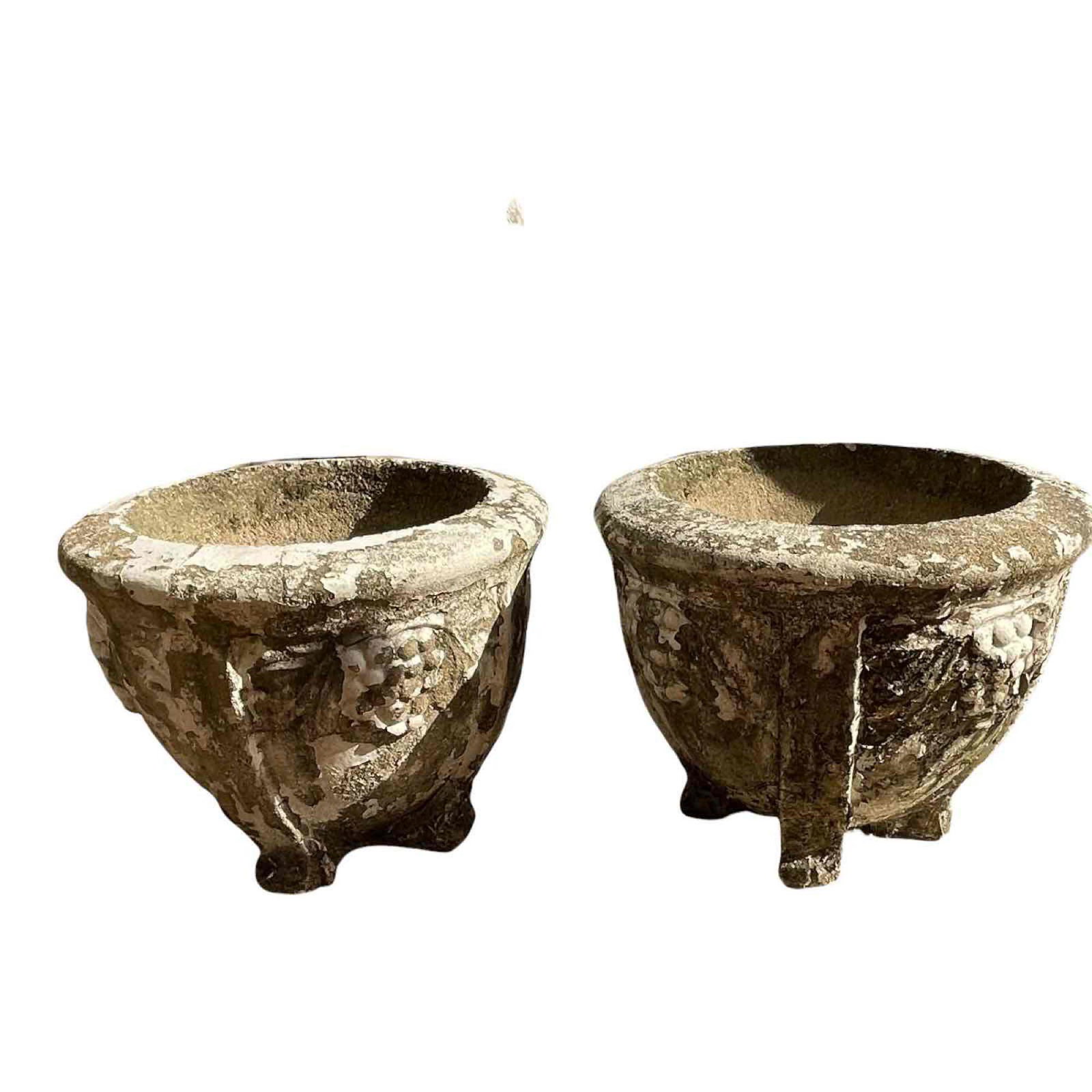 Pair of Art Deco Carved Stone Garden Planters / Jardinieres: A fine pair of antique, early 20th century garden planters. Signs of uses and wear typical with age as shown, see photos. Approximate dimensions: 13" h. x 16 1/2" diameter each.