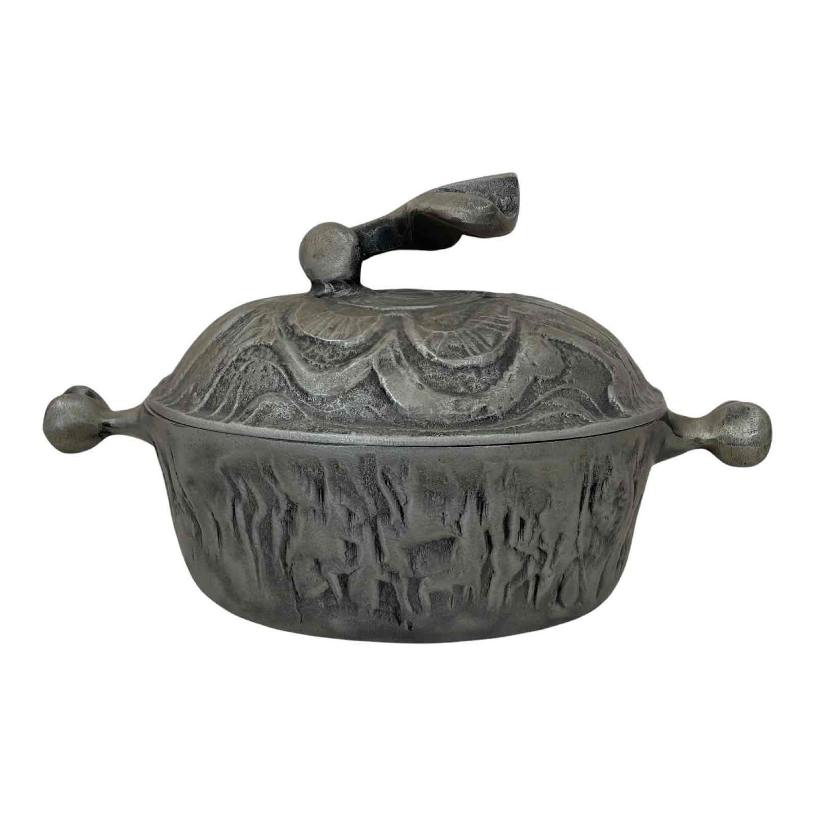 Early Don Drumm Casserole Dish: A Brutalist oval covered casserole dish from Don Drumm's early work with matte finish. Signed on base "Drumm 1970" along with "5 Qt" and other marks. Approximate dimensions: 9" h. x 16 1/2 l. (handle-