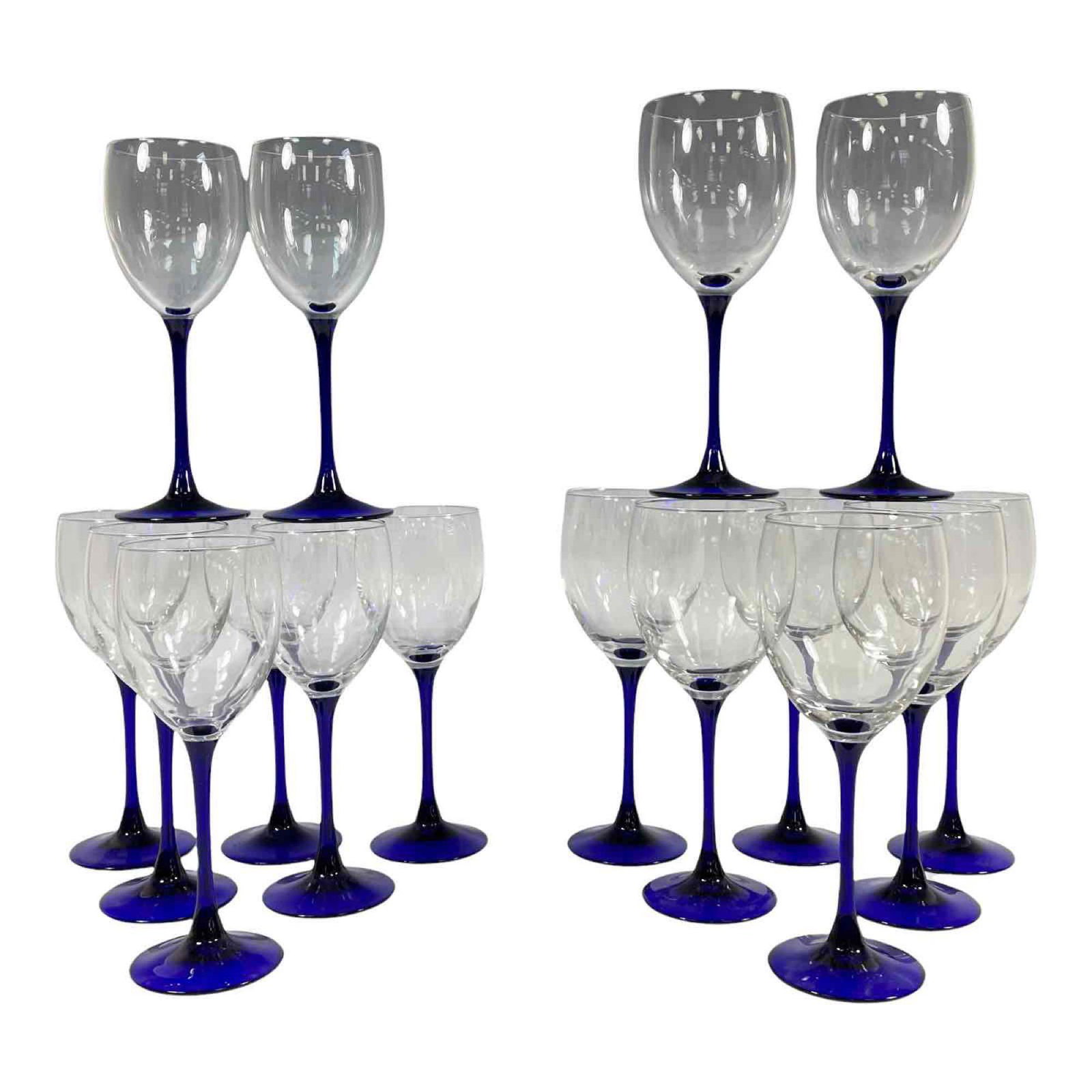France COBALT BLUE &CLEAR Wine Glasses: Two sets of eight red and white wine stems with clear body and cobalt blue pedestal stems as shown. Two sets of 8 marked FRANCE on bottom as shown. One small base rim nic as shown, see photos for deta