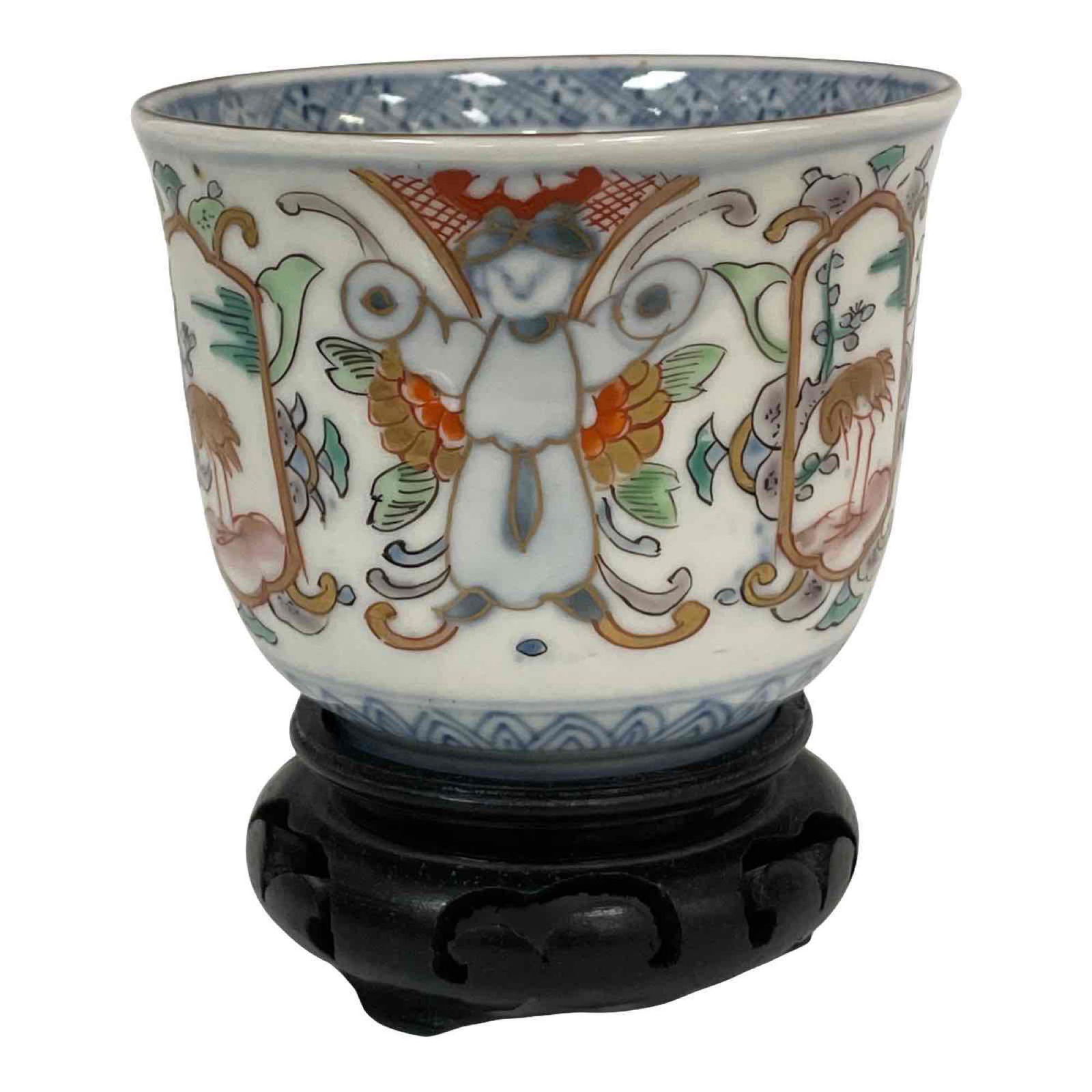 Imari Porcelain Cup: Hand-painted Imari Porcelain Tea or Soba Cup. Good condition with appropriate signs of age, wear, and use, see photos for details. Approx 3 3/4" h. including stand.