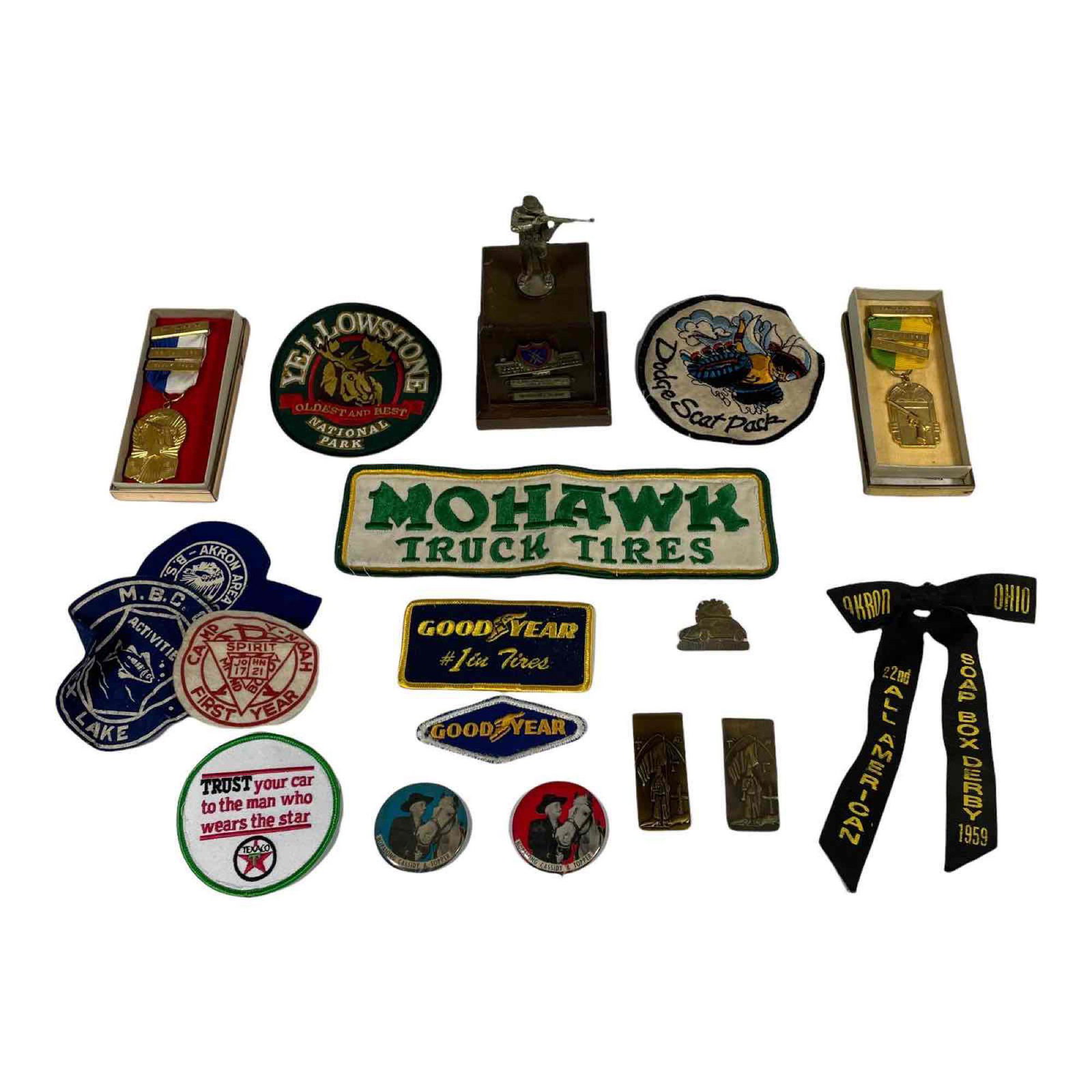Gentleman's and Military Group Lot: Including; Daniel Low &Co. KKK money clips (2), Nazi VW pin, 1965 Army Shooting Trophy, Canton Pistol Club Award Medals, vintage patches, 1959 soap box derby award pin, Hopalong Cassidy pins. See phot
