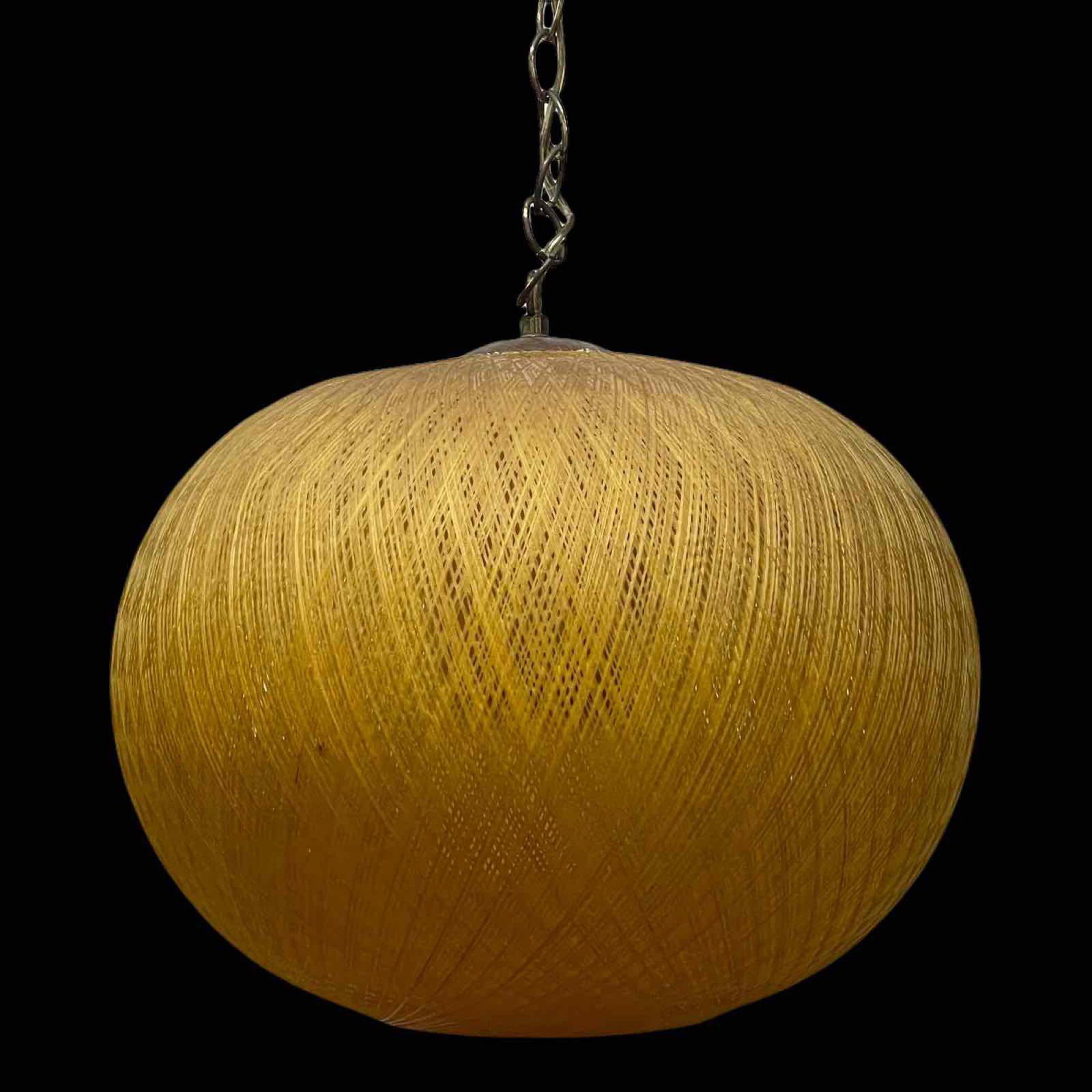 Mid-Century Modern Spun Gold Fiberglass Spaghetti Light: Measuring approximately 14 inches tall by 16 inches in diameter. Fiberglass molded mid-century modern. In good working condition as shown see photos.