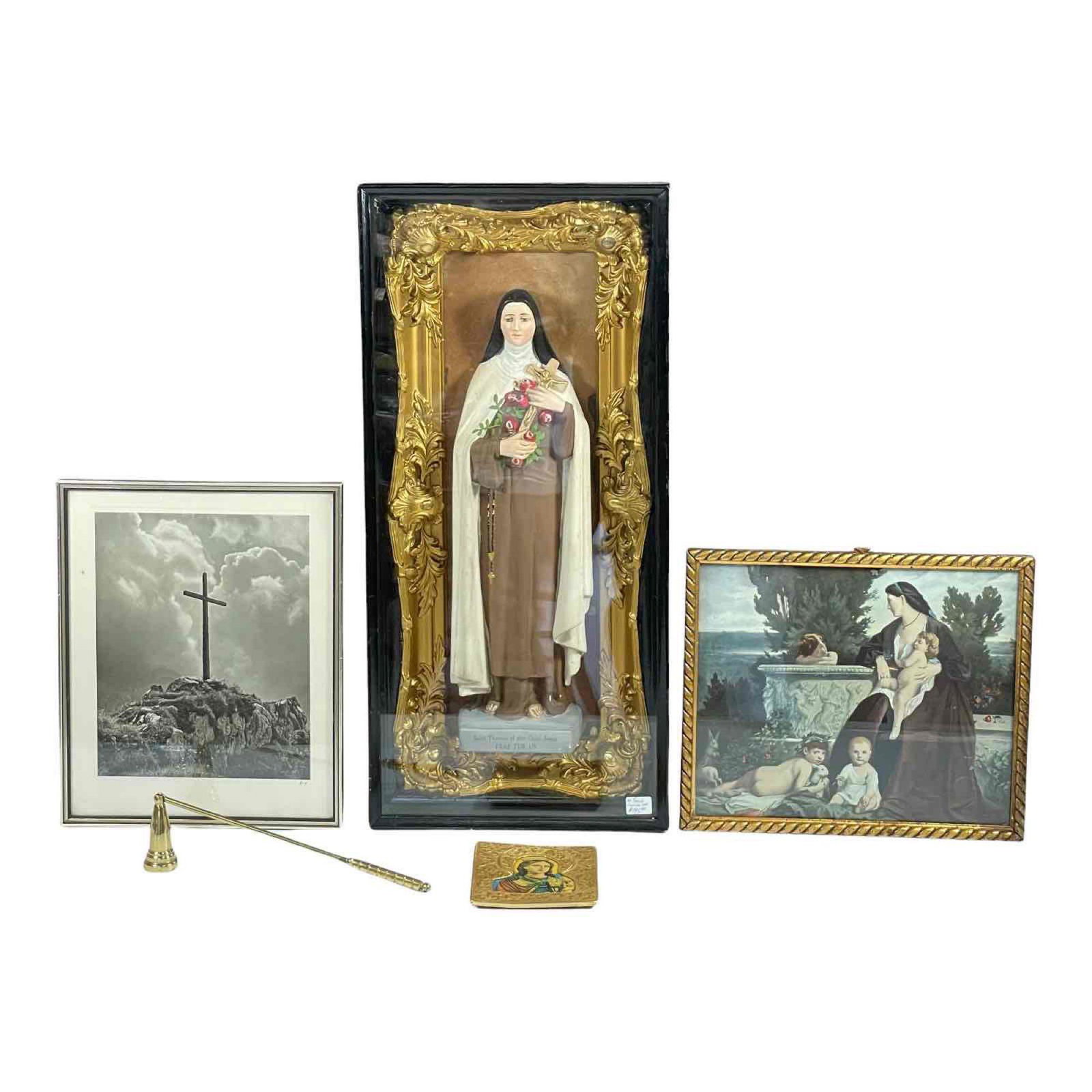 Religious Framed Piece Group Lot (5): Including; St. Therese shadow box framed figurine measuring approx. 22.5" tall x 10.5" wide x 3.25" deep, framed print with woman and children, gold tone religious icon, candle extinguisher and framed