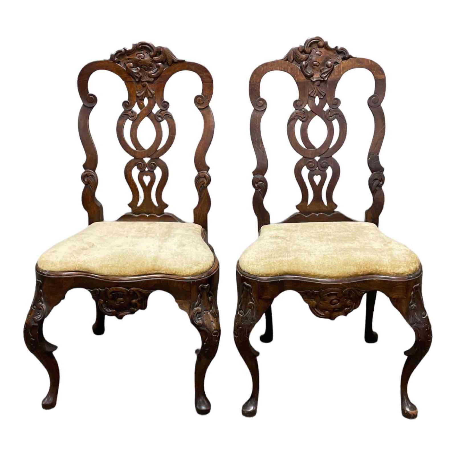 Pair of 18th Century Carved Italian Chairs: Fine pair of elegantly carved 18th century Italian chairs. Measuring approx 42" tall. One crack in the back as shown, otherwise good condition, see photos.