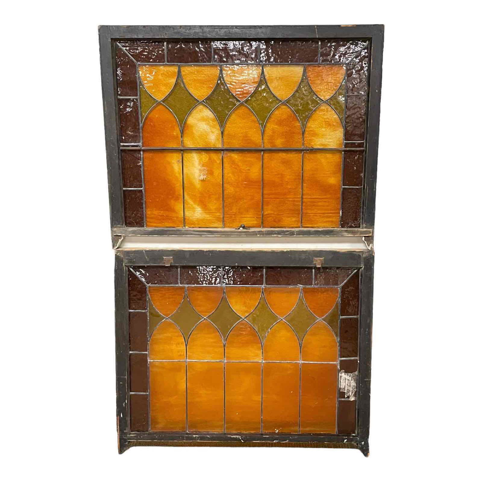 Set of Large Early 20th Century Stained Glass Windows: Each measuring approx 44" wide x 36" tall. One has two cracked panels and the other has one, see photos for details. They still display very well as shown.
