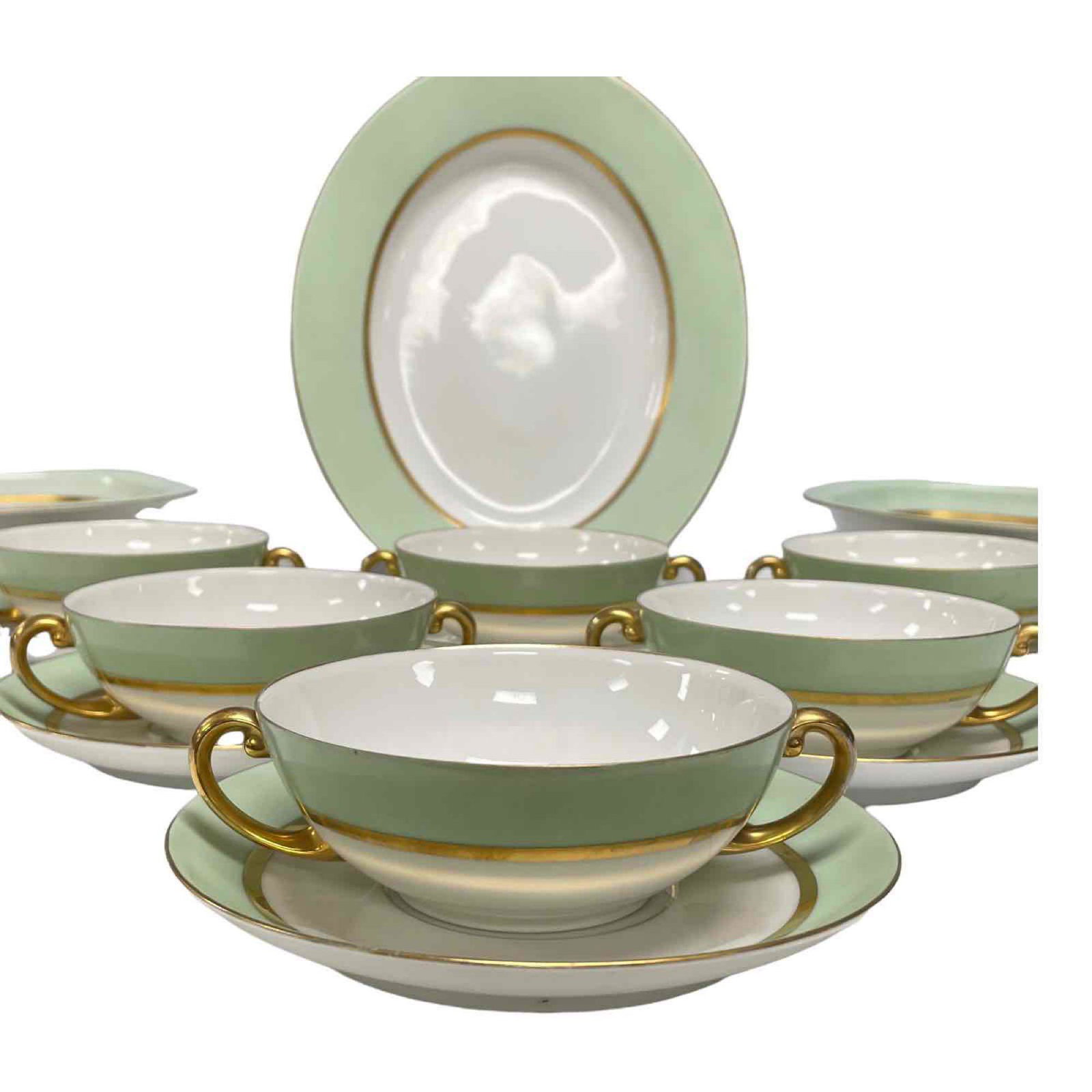 15 Piece Tirschenreuth Dinnerware: Includes; six soup boullions, six saucers, teo serving bowl and one 12" platter. In good age appropriate condition with some losses to gold paint trim, see photos.