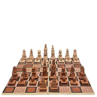 Carved Stone MAYAN MASTER Guatemalan Chess Set: Carved stone Aztec Mayan motif. Four separate 12" tiles make up the board and carved figural chess pcs as shown. Signed and GUATEMALA on few of the pcs as shown, see photos for details.