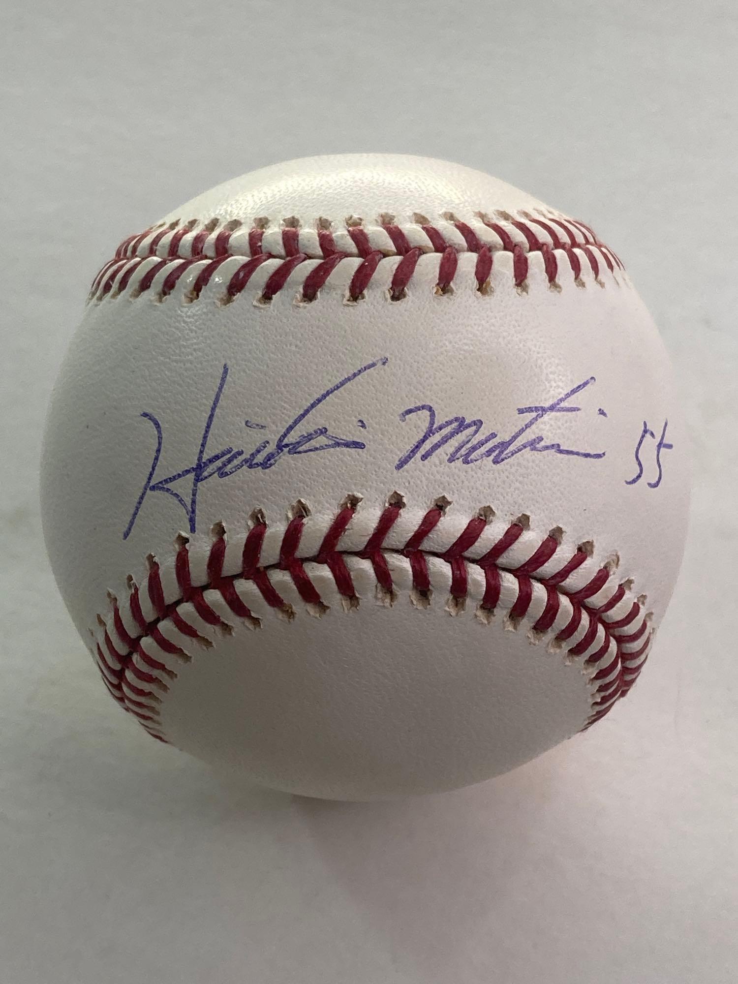 Hideki Matsui Rookie Full Signature Yankees 100th Anniversary Baseball: Official Bud Selig New York Yankees 100th Anniversary logo baseball. Blue pen signature on the sweet spot. Matsui signed this way at the beginning of his career. JSA certified.
