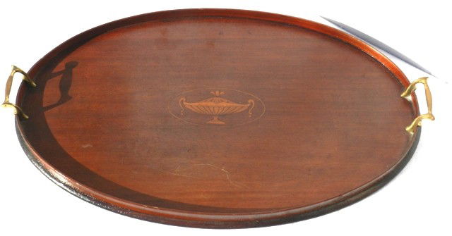 Regency stylized Inlaid Tea Tray: With center urn inlay, brass formed handles and in good condition. Approx 24" x15" in size.