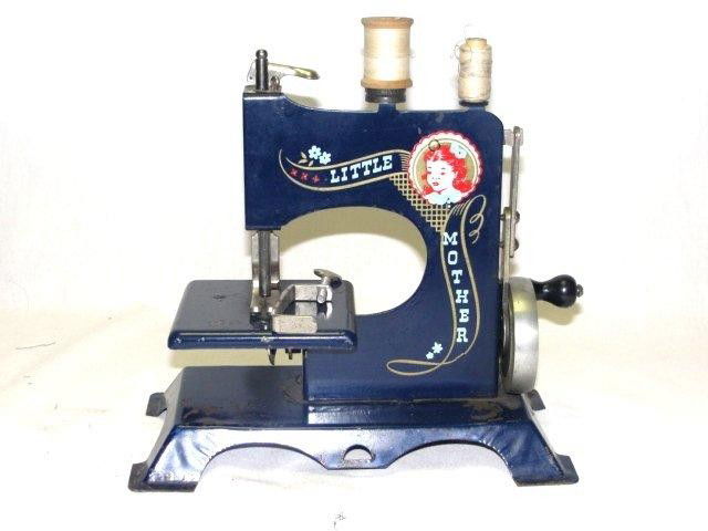 JK Child Vintage Little Mother Sewing Machine: ade by Artcraft Metal Products, Inc. of West Haven, Connecticut, USA. Condition has some paint loss on base, used, in original box