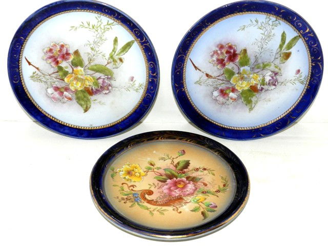 3 Carlton Ware Victorian Tea Pot Stands: All rounf with flow blue borders and in good condition. Ca 1880's
