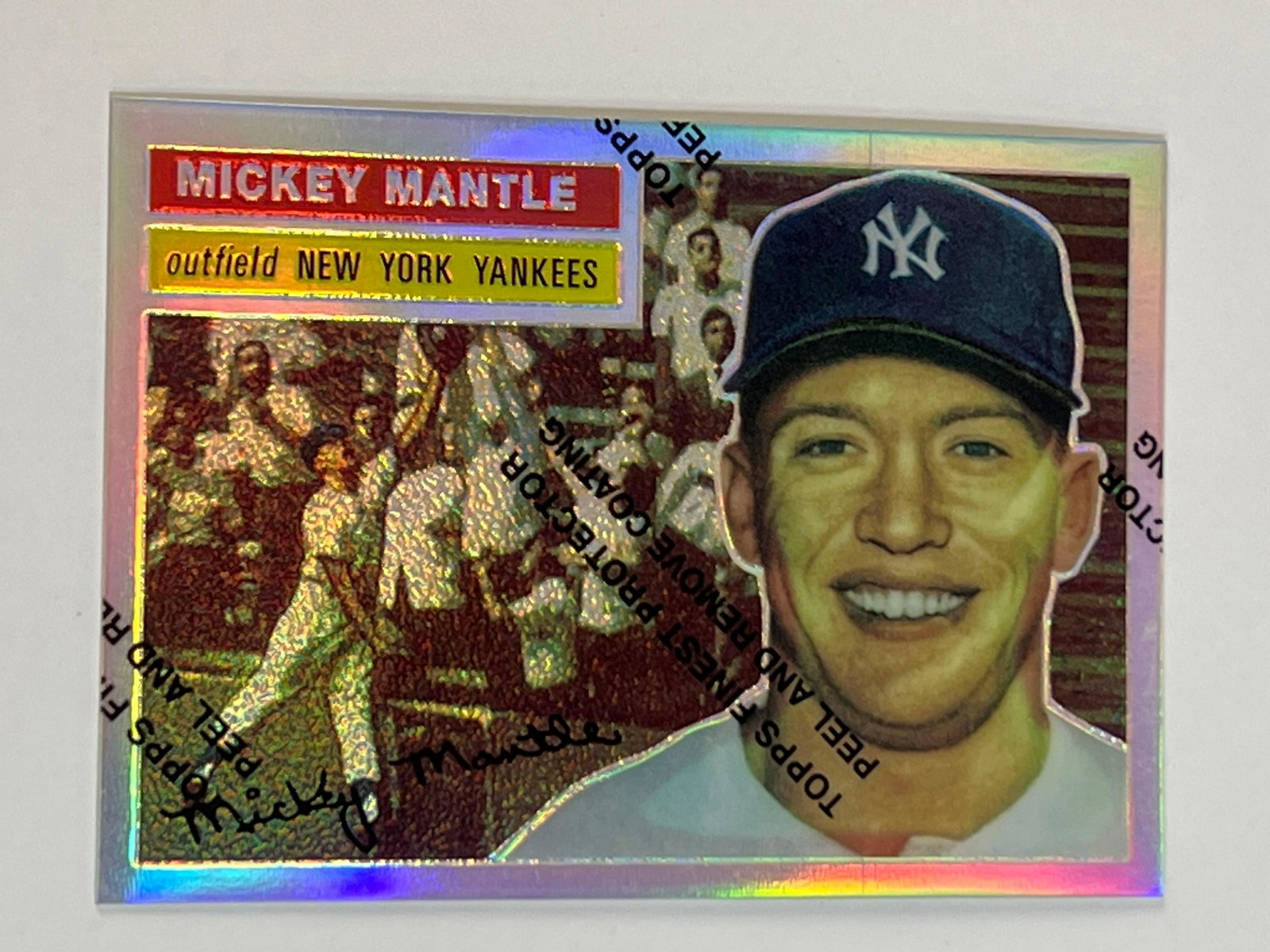 1996 Topps Mickey Mantle Refractor 1956 w/ Coating: Condition: Any condition statement is given as a courtesy to a client, is only an opinion and should not be treated as a statement of fact. Premier Auction Galleries LLC shall have no responsibility f