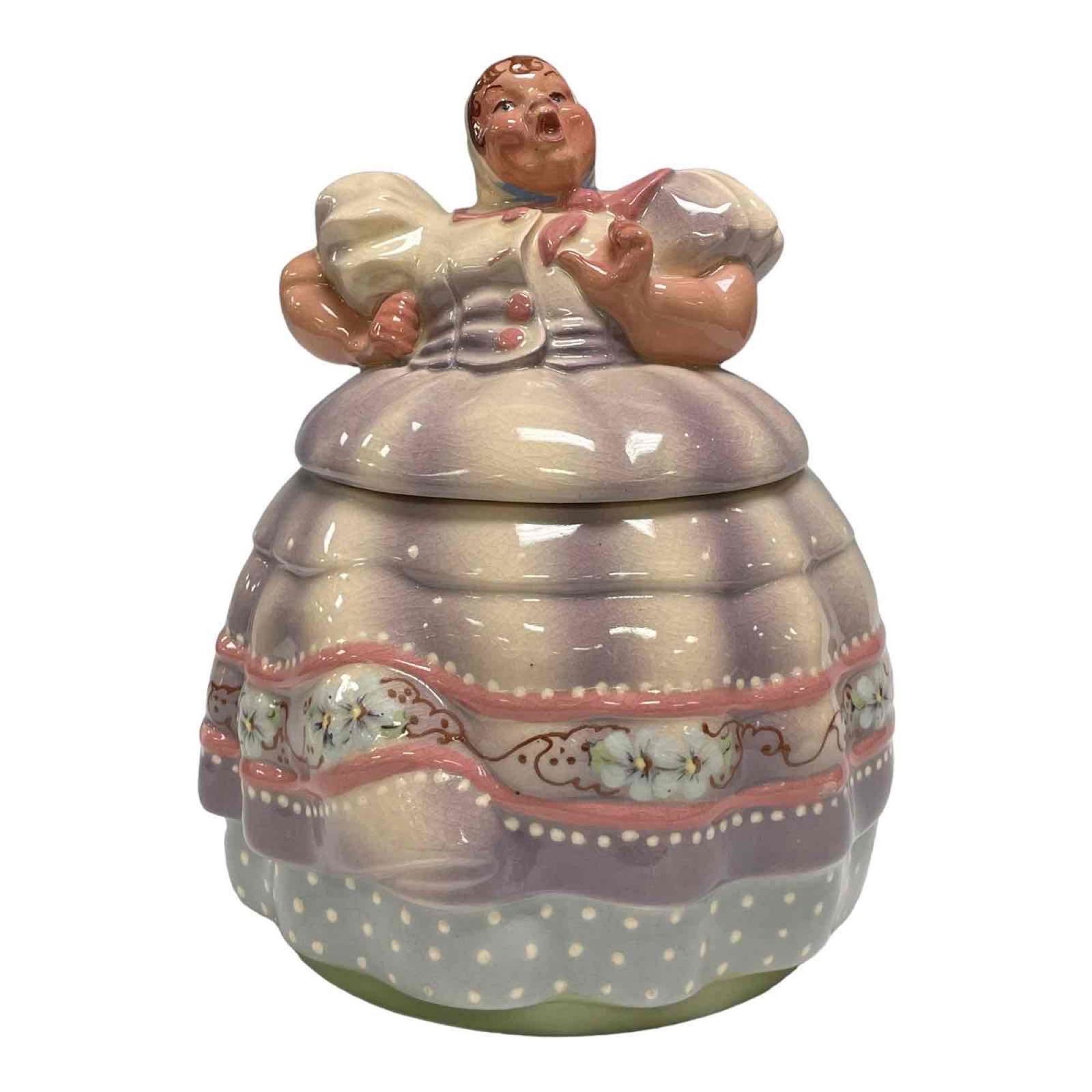 1940's Helen Hutula Tat-L-Tale Cookie Jar: This hard- to-find Helen Tat-L-Tale cookie jar in the polk-a-dot dress design, is in good condition. Fully signed on the bottom and marked "Original". Measuring approx 11 1/2" h. and 8" dia. Some craz