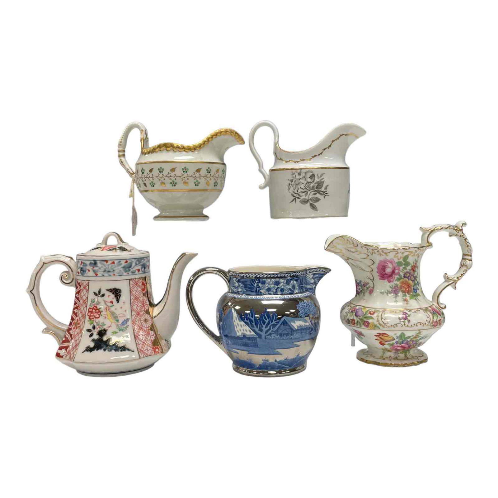 Group of Five Antique English Creamers and Teapot: Includes Dresden Springs floral motif creamer approx 6" tall, Wedgwood FALLOW DEER silver luster creamer, two 19th century English creamers and a KOSEN Japanese Imair style lidded teapot approx 6". Go