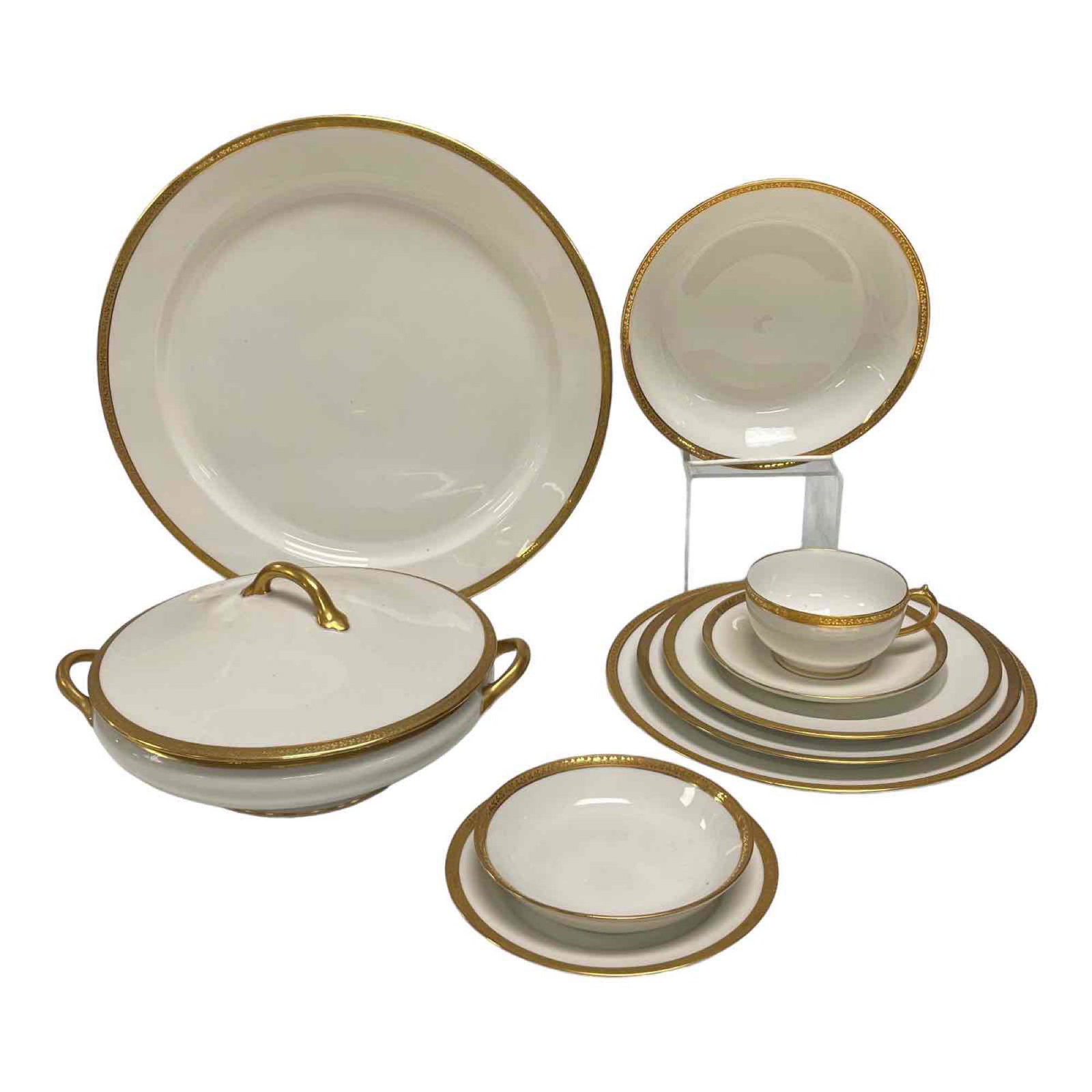 Limoges Ivory with Gold Band Service for Ten: Service for ten Limoges by Gerard, Dufraisseix and Abbot. Gold encrusted clover band on white. Full service for ten plus ten extra pieces. Overall good condition with a few chipped pieces, see photos.