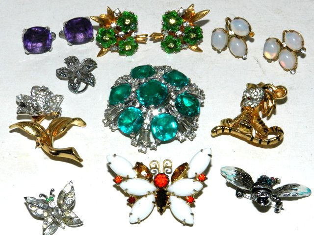 JOMAZ Designer Costume Jewelry -Sterling: Including 2" brooch with light green faux stones and clear rhinestones, gold tone tiger pin, gorgeous silver tone rhinestone rose with gold tone stem, clip earring with green stones, pair of sterling