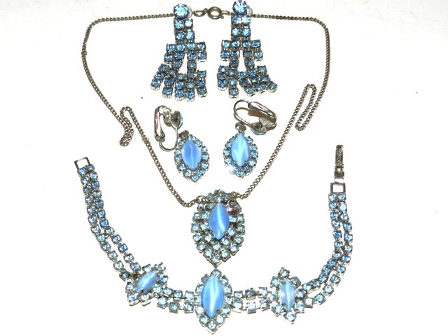 Opal & Blue Rhinestone Collection Lot: Including a 3pc set and additional clip earrings. All lots in this auction are consignments of the Well known Harding Estate of Olmsted Falls, OH.