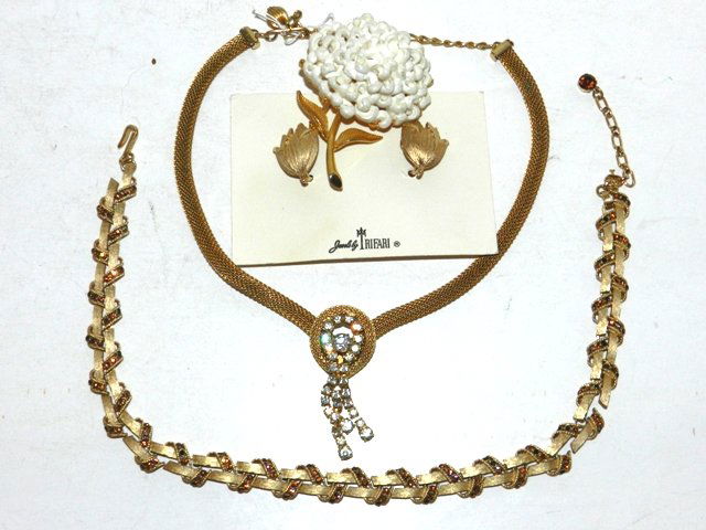 Trifari, Monet Jewelry and More: Including Monet Pin, Trifari clip earring and a rhinestone necklace. All in very good condition. All lots in this auction are consignments of the Well known Harding Estate of Olmsted Falls, OH.