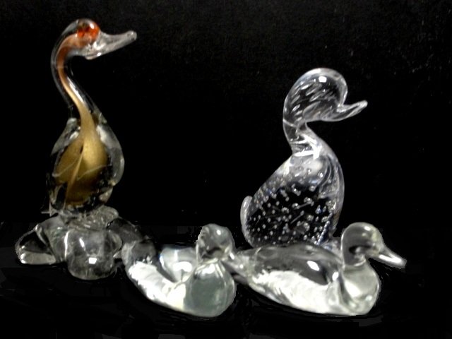 Fenton, Murano, Whitefriar Paperweights: Whitefrirs flint glass duck with controlled bubbles encased.5 1/2'' Tall. Attributed to Murano goose paperweight with orange eyes and gold inside incased body. 6 3/4'' Tall. Along with two Fenton mall