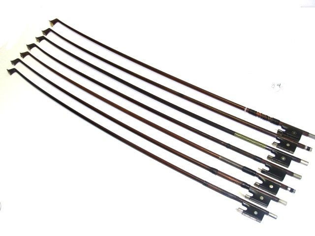 Collection Of Seven Vintage Violin Bows: Condition used, in various sizes. Ebony frog with pearl eye's.