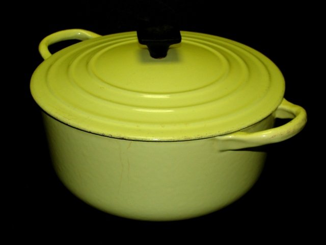 Le Creuset Round Casserole French Oven: Dijon Yellow 5 1/4 quart. Made of enameled cast iron--unexcelled for heat distribution, retention Cast iron distributes heat evenly and requires cooking with only low to medium temperatures Flat cookw